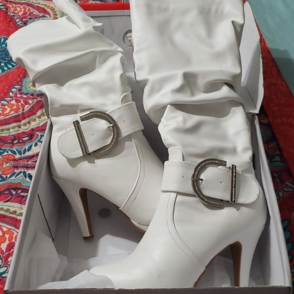 White high heeled boots